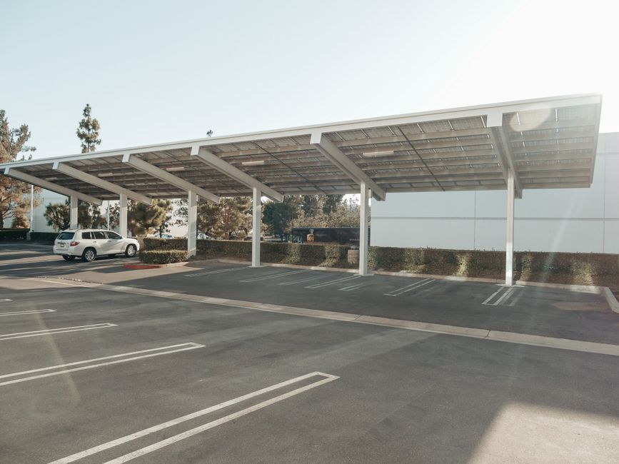 Professional crew installing a metal carport during installation process