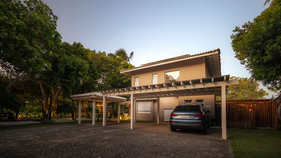 Customized 20x20 metal carport with side panels and vertical roof